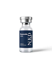 a bottle of nkd serum on a white background